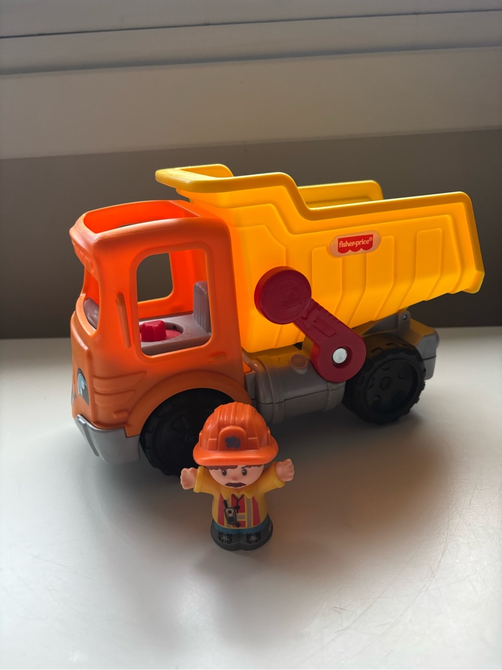 Fisher price little people construction figure with dump truck